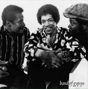 (Band of Gypsys) Billy Cox, Jimi Hendrix, and Buddy Miles share a light moment