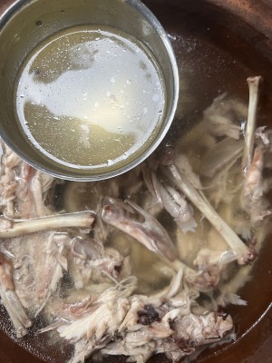 Nutritious bone broth simmering in a Miriam