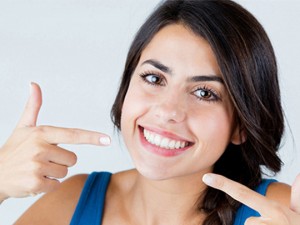 Unlock Your Brightest Smile: Discover the Compelling Benefits of Teeth Whitening