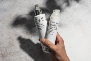 Cocoa Cream and Active Muscle Therapy Balm in hand