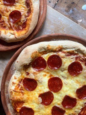 Delicious Pizza baked on a Miriam