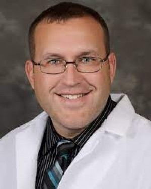 Justin Grill, DO, MHA, MEdHP, an Emergency Physician with Trinity Health Muskegon Hospital