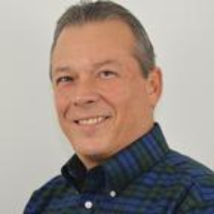 Carlos Renzo, Recognized by BestAgents.us as a 2023 Top Agent.