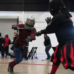 Nolan Duino conducts an intro to longsword class for spectators
