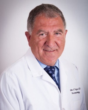 Carlos A. Vargas, MD, a Gastroenterologist with GastroMed