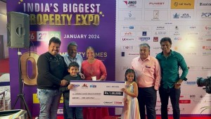 Mr Bhaskar Kamat the first winner of the hourly walk in lucky draw of CREDAI MCHI INDIA s BIGGEST PR