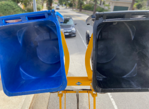 Two clean garbage cans after trash can cleaning service by WASH BINS