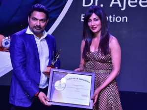  Dr. Ajeenkya DY Patil receiving the award from the hands of Chitrangada Singh.