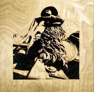 Tall in the Saddle, Pyrography on wood