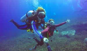 underwater scuba diving selfie shot with selfie stick