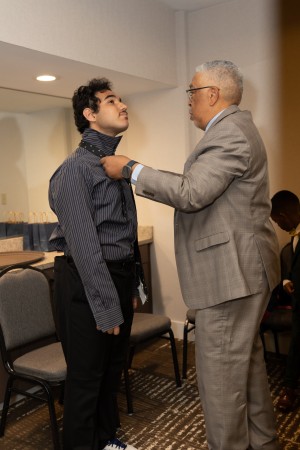 A student who found her outfit: shoes, dress ad bag