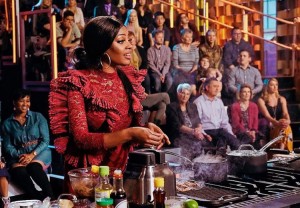 Keturah King preparing her meal to score an apron