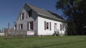 This is my grandparents log home that became the bedroom wing on the left side