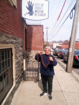 Andrew Earl Singer holding the Slave Chain/Spike
