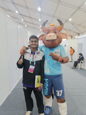 Mario Pimenta as Media Volunteer at National Games 2022 Goa with The National Games Mascot MOGA