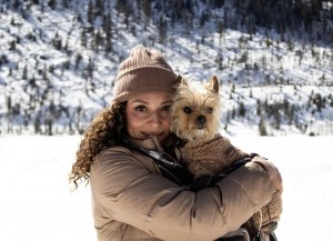 Her and her dog enjoying the snow in the mountains of Colorado