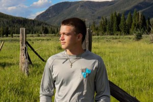 Teen trail walking and enjoying the Rocky Mountains