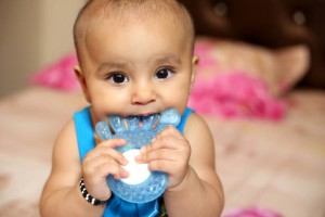 Baby playing with teether