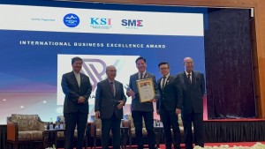 International Business Excellence award presented by Tan Sri Bernard Giluk Dompok  to W Straits Ltd