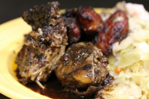 jerk chicken meal with rice and peas, steamed cabbage and plantains
