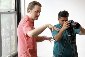 Joseph Holmes (Left) directing 