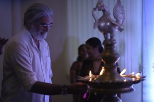 Photographer Chandra Prakash Lighting the Lamp 