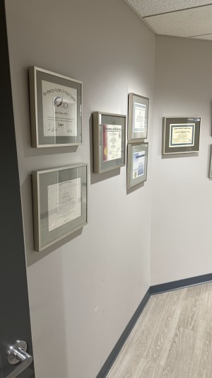 Awards in the Hallway at Hilliard dentist Innovative Dental Ideas James E Butler DMD Fellow IAMDI