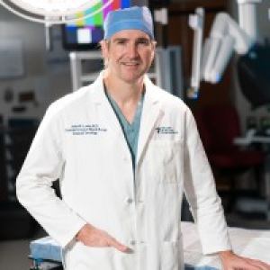 John M. Lyons, III, MD, FACS, FSSO: Pioneering Cancer Care Through Collaborative Practice and Minimally Invasive Surgery