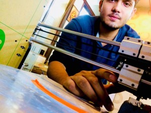 Sumit with his 3D printer