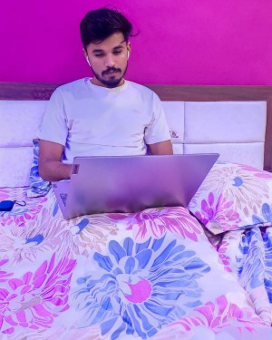 Chiman Maru sharing insights on IT and business growth at a seminar.