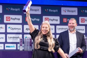 Kym Sugar of The Property Centre’s Cheltenham office accepting an award. Picture: Simply Photograp