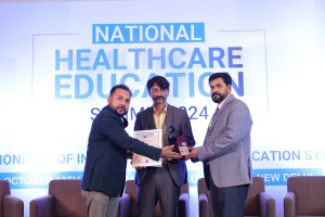 Naresh Chauhan Recieving Excellence in Healthcare Education Awards