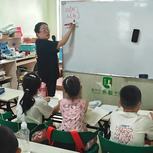 Chang McCarthy imparting literacy skills to Rural Chinese Children