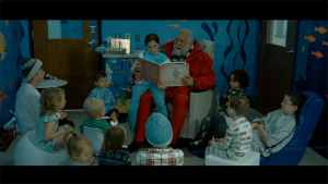 Saint Nick of Bethlehem: Reading to the children at hospital