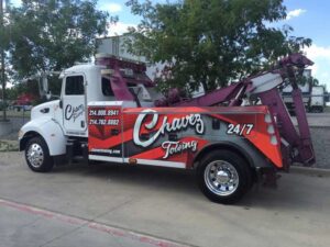 white chavez towing truck 300x225
