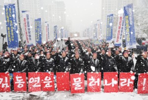 Shincheonji Church of Jesus members protest the unjust cancellation of major event.