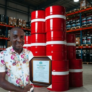 Gbenga Akomolafe Proudly showing off MANCAP certificate for LubeMax Lubricants