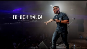 Original caption of F Rob Galea on stage