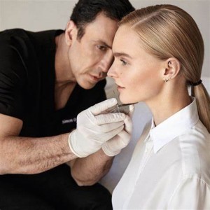 Dr. Simon Ourian treating a patient