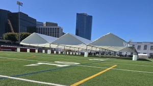 2025 student run marathon far view 3 120by30ft tent setup on field