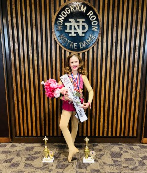 Jocelyn Foran represents Florida in the 2019 National Juvenile Beginner Pageant, and displays awards won during her week of competition at AYOP.