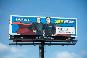 Billboard near the office of Houston dentist Mills Dental Group