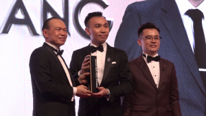 Terence Teoh receiving the 100MIYE Award