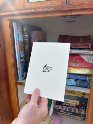 Little Written Art card in Little Free Library