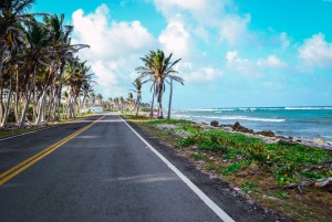 beautiful shot beach road with cloudy blue sky background