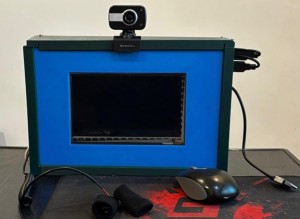 A close up of AnxiQure  a non invasive device used to detect anxiety based on facial emotions and GS