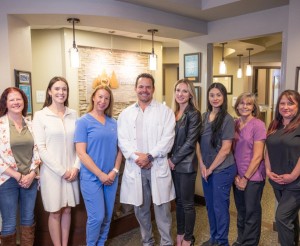 Colorado Periodontal Associates team standing in their Wheat Ridge office