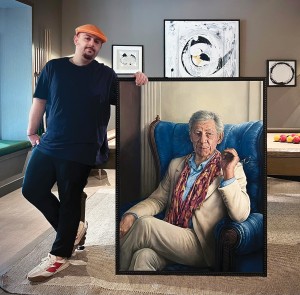 Dorian Radu with the Sir Ian McKellen portrait