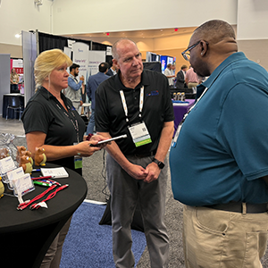 Cogent booth with visitors