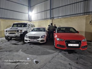 Hummer Mercedes C300 Cabriolet and Audi A3 Parked in Garage